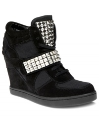 Fashion-forward and futuristic. Steve Madden's Hamlit wedge sneakers feature shiny square studs along the vamp and tongue. Fashion-forward and futuristic. Steve Madden's Hamlit wedge sneakers feature shiny square studs along the vamp and tongue.