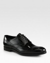 Leather wing-tip style with perforations for a detailed finish.Leather upperLeather liningLeather soleMade in Italy