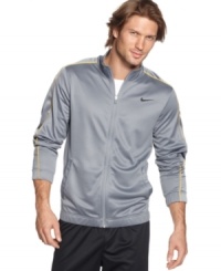 With a cool casual look and Dri-Fit technology for comfort, this Nike jacket is perfect for days when you're constantly on the go. With a cool casual look and Dri-Fit technology for comfort, this Nike jacket is perfect for days when you're constantly on the go.