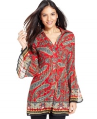 A bold paisley print and pleated detail makes this tunic-style top from Sunny Leigh a vibrant addition to your wardrobe. A bold paisley print and pleated detail makes this tunic-style top from Sunny Leigh a vibrant addition to your wardrobe.