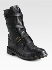 Rich Italian leather forms this slouchy staple, wrapped with adjustable buckle straps for a casual-cool look. Stacked heel, 1¼ (30mm)Shaft, 8½Leg circumference, 11Leather upperPull-on styleAdjustable buckle strapsLeather liningRubber solePadded insoleMade in Italy Rich Italian leather forms this slouchy staple, wrapped with adjustable buckle straps for a casual-cool look. Stacked heel, 1¼ (30mm)Shaft, 8½Leg circumference, 11Leather upperPull-on styleAdjustable buckle strapsLeather liningRubber solePadded insoleMade in Italy