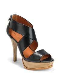 THE LOOKWide leather straps on topBack zipperPadded insoleStacked heel, 4¼(110mm)Stacked platform, 1½(40mm)Compares to a 2¾ heel(70mm)THE MATERIALVegetal leather upperLeather lining and soleORIGINImported THE LOOKWide leather straps on topBack zipperPadded insoleStacked heel, 4¼(110mm)Stacked platform, 1½(40mm)Compares to a 2¾ heel(70mm)THE MATERIALVegetal leather upperLeather lining and soleORIGINImported