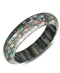 Like a beautiful piece of artwork, this stunning slip-on bangle combines tiny pieces of Mother of Pearl in a unique mosaic pattern. Approximate length: 7-1/2 inches. Like a beautiful piece of artwork, this stunning slip-on bangle combines tiny pieces of Mother of Pearl in a unique mosaic pattern. Approximate length: 7-1/2 inches.