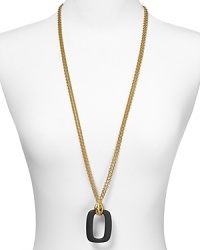 Air on the subtle side of statement-making with this gold-tone necklace from T Tahari. It's resin link pendant is an understated way to define your neckline.