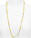 Inspired by 50's-era costume gems, kate spade new york's gold and yellow enamel strand adds a chic shot of color. With delicate, scattered stations - this piece has the style and the textured flair to spare.