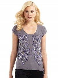 THE LOOKWoven crepe top with beaded and sequined floral designScoop necklineCap sleevesStraight front hem, curved back hemBack has low horizontal seam with gatheringTHE FITAbout 25 from shoulder to center of back hemTHE MATERIALPolyesterCARE & ORIGINHand washImported THE LOOKWoven crepe top with beaded and sequined floral designScoop necklineCap sleevesStraight front hem, curved back hemBack has low horizontal seam with gatheringTHE FITAbout 25 from shoulder to center of back hemTHE MATERIALPolyesterCARE & ORIGINHand washImported