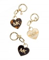Keep your keys close to the heart with this exquisite key chain from MICHAEL Michael Kors, featuring the iconic MK logo upon an enamel and tortoise backdrop. Each romantic heart dangles discretely from a pretty, polished key ring with a petite companion hang tag.