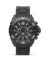 Michael Kors perfects sporty-sleek style with this matte black watch. Boasting a bold face and silicone strap, it's ready to go from the office to the great outdoors.