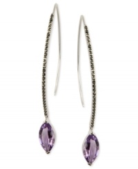 Embrace elegance with Judith Jack's drop earrings. This pair is crafted from sterling silver with marquise-shaped amethysts (5 ct. t.w.) and marcasite (1/2 ct. t.w.) providing a vibrant pop. Approximate drop: 2-6/10 inches. Approximate diameter: 1 inch. Embrace elegance with Judith Jack's drop earrings. This pair is crafted from sterling silver with marquise-shaped amethysts (5 ct. t.w.) and marcasite (1/2 ct. t.w.) providing a vibrant pop. Approximate drop: 2-6/10 inches. Approximate diameter: 1 inch.