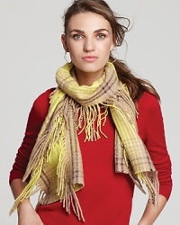 For a classic winter look, wrap up in Echo's plaid-patterned woven scarf with long fringe edges. For a classic winter look, wrap up in Echo's plaid-patterned woven scarf with long fringe edges.