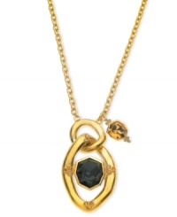 Center of attention. T Tahari's necklace features a black crystal secured in a pendant, with an amber-hued accent. Crafted from nickel-free 14k gold-plated mixed metal. Approximate length: 32 inches. Approximate drop: 2-7/8 inches. Center of attention. T Tahari's necklace features a black crystal secured in a pendant, with an amber-hued accent. Crafted from nickel-free 14k gold-plated mixed metal. Approximate length: 32 inches. Approximate drop: 2-7/8 inches.