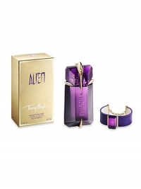 Indulge yourself with the ALIEN fragrance and Thierry Mugler fashion. Included in this purchase of an ALIEN 2 oz. Eau de Parfum Refillable Spray is a genuine leather signature Mugler bracelet featuring a faceted purple glass stone and golden accents. The perfect gift for any Goddess. 