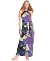 A tropical floral print makes a festive summer statement on this T Tahari maxi dress -- perfect for warm-weather getaways! A tropical floral print makes a festive summer statement on this T Tahari maxi dress -- perfect for warm-weather getaways!