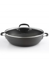 Your go-to in the kitchen! A hard-anodized exterior and nonstick interior provides the perfect space for sauteing, simmering, browning and preparing entire meals. Even faster clean-up and even smarter, healthier cooking is all yours with the versatility of this do-it-all pan. 10-year warranty.