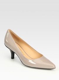 Glossy patent leather forms this timeless point toe silhouette fit for a lady. Stacked heel, 2½ (65mm)Patent leather upperPoint toeLeather liningRubber solePadded insoleMade in Italy Glossy patent leather forms this timeless point toe silhouette fit for a lady. Stacked heel, 2½ (65mm)Patent leather upperPoint toeLeather liningRubber solePadded insoleMade in Italy