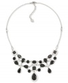 Take on the night with this collar necklace from Carolee. Adjustable and crafted from silver-tone mixed-metal, the necklace features stunning glass black stones for a bold effect. Approximate length: 16 inches + 2-inch extender. Approximate drop: 3 inches.