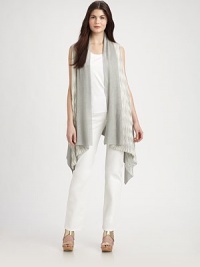 Shawl-collar vest, in a diamond parquet stitch, is super soft and lightweight, perfect to dress up or down.SleevelessShawl collarSolid borderAsymmetric hemAbout 42 from shoulder to hem88% viscose/12% polyamideHand wash or dry cleanImported of Italian fabricModel shown is 5'10 (177cm) wearing US size Small. Additional Information Women's Modern Size Guide Shawl-collar vest, in a diamond parquet stitch, is super soft and lightweight, perfect to dress up or down.SleevelessShawl collarSolid borderAsymmetric hemAbout 42 from shoulder to hem88% viscose/12% polyamideHand wash or dry cleanImported of Italian fabricModel shown is 5'10 (177cm) wearing US size Small. Additional Information Women's Modern Size Guide