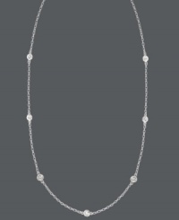 Sparkle by the inch. 11 stations of round-cut cubic zirconias (1-1/10 ct. t.w.) adorn B. Brilliant's lovely sterling silver necklace. Approximate length: 36 inches. Sparkle by the inch. 11 stations of round-cut cubic zirconias (1-1/10 ct. t.w.) adorn B. Brilliant's lovely sterling silver necklace. Approximate length: 36 inches.