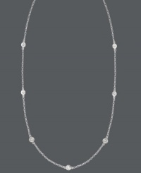 Sparkle by the inch. 11 stations of round-cut cubic zirconias (1-1/10 ct. t.w.) adorn B. Brilliant's lovely sterling silver necklace. Approximate length: 36 inches.