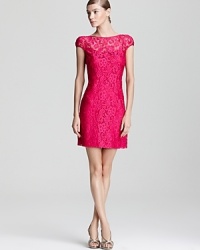 An eye-catching hue pops on this Theia cocktail dress, fashioned in delicate lace for a romantic finish. An eye-catching hue pops on this Theia cocktail dress, fashioned in delicate lace for a romantic finish.