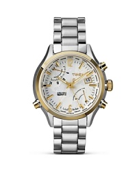 World travel inspires this silver plated watch from Timex. Designed to translate in every time zone, it features a season indicator, world time feature, and date display window.