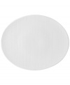 A fine line. Simply timeless, the French Organza oval platter is reminiscent of sheer silk, with a white-on-white pattern in versatile porcelain. A flawless choice for the contemporary home, by Bernardaud.