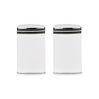 These salt and pepper shakers translate Kate Spade's signature contrast stitching with simple black banding and fine white dots. These salt and pepper shakers translate Kate Spade's signature contrast stitching with simple black banding and fine white dots.