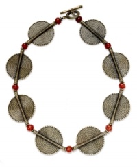 Keep your social circle envious with this collar necklace from Lauren Ralph Lauren. Textured disc pendants are displayed with red acrylic beads. Crafted in gold tone mixed metal. Approximate length: 18 inches + 2-inch extender.
