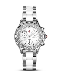 Michele's Tahitian chronograph watch is a statement of timely elegance. Detailed with a beautiful diamond bezel, a K-1 mineral crystal and deployant closure. Michele's Tahitian chronograph watch is a statement of timely elegance. Detailed with a beautiful diamond bezel, a K-1 mineral crystal and deployant closure.