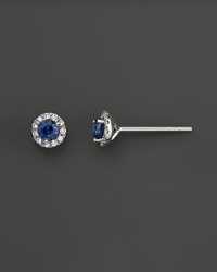Diamonds and sapphires in 14K white gold earrings. Diamonds and sapphires in 14K white gold earrings.