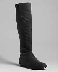 These tall, flat boots feature a casual shape and appeal that's simply Elieen Fisher. These tall, flat boots feature a casual shape and appeal that's simply Elieen Fisher.