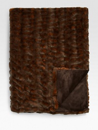 Decadently soft faux fur, designed and created in the USA of the most natural, authentic-looking fabrics. The rigorously inspected collectible is individually handcrafted and lined in velvet. 60 X 75AcrylicMachine washMade in USA Decadently soft faux fur, designed and created in the USA of the most natural, authentic-looking fabrics. The rigorously inspected collectible is individually handcrafted and lined in velvet. 60 X 75AcrylicMachine washMade in USA