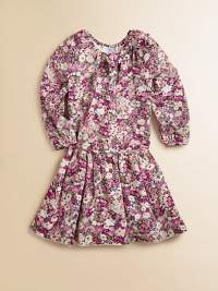 A brilliant floral print adds style and substance to this warm-weather ready frock with elastic neckline and waist for easy on and off.Round elastic necklineLong puff sleevesPullover styleElastic drop-waistGathered skirtMachine washCottonMachine washImported A brilliant floral print adds style and substance to this warm-weather ready frock with elastic neckline and waist for easy on and off.Round elastic necklineLong puff sleevesPullover styleElastic drop-waistGathered skirtMachine washCottonMachine washImported