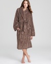 Plushly textured and satin-trimmed, PJ Salvage's fleece robe puts a wrap on staying warm this winter.