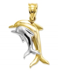 Make an extra big splash this summer. This adorable double dolphin pendant is crafted in 14k gold and sterling silver. Approximate length: 9/10 inch. Approximate width: 6/10 inch. Make an extra big splash this summer. This adorable double dolphin pendant is crafted in 14k gold and sterling silver. Approximate length: 9/10 inch. Approximate width: 6/10 inch.