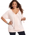 Indulge in the casual elegance of INC's short sleeve plus size peasant top, accented by crochet trim.