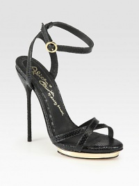 A sky-high stiletto heel and lacquered platform elevate this strappy favorite in lizard-print leather. Self-covered heel, 5¼ (130mm)Lacquered island platform, ½ (15mm)Compares to a 4¾ heel (120mm)Lizard-print leather upperAdjustable ankle strapLeather lining and solePadded insoleImported A sky-high stiletto heel and lacquered platform elevate this strappy favorite in lizard-print leather. Self-covered heel, 5¼ (130mm)Lacquered island platform, ½ (15mm)Compares to a 4¾ heel (120mm)Lizard-print leather upperAdjustable ankle strapLeather lining and solePadded insoleImported