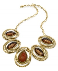 An alluring look from Style&co. Acrylic stones in topaz hues captivate on a golden chain. Crafted in antiqued gold tone mixed metal. Approximate length: 18 inches. Approximate drop: 1-3/4 inches. An alluring look from Style&co. Acrylic stones in topaz hues captivate on a golden chain. Crafted in antiqued gold tone mixed metal. Approximate length: 18 inches. Approximate drop: 1-3/4 inches.