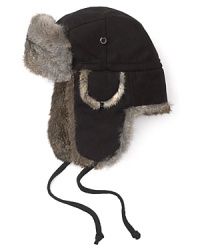 A blended wool exterior is trimmed with luxurious rabbit fur for elegant warmth all winter long. A blended wool exterior is trimmed with luxurious rabbit fur for elegant warmth all winter long.