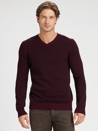 The perfect option for transitional weather, this versatile v-neck, shaped in a luxurious wool and cashmere blend, can be worn alone, or layered, as those cold weather days approach.V-neckRibbed collar, cuffs and hem70% wool/30% cashmereHand washImported The perfect option for transitional weather, this versatile v-neck, shaped in a luxurious wool and cashmere blend, can be worn alone, or layered, as those cold weather days approach.V-neckRibbed collar, cuffs and hem70% wool/30% cashmereHand washImported