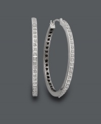 Let your style shine from the inside out! These exotic hoops feature a unique design with black diamond accents on the inside and white diamond accents on the outside. Crafted in 14k white gold. Approximate diameter: 1-1/4 inches. Let your style shine from the inside out! These exotic hoops feature a unique design with black diamond accents on the inside and white diamond accents on the outside. Crafted in 14k white gold. Approximate diameter: 1-1/4 inches.