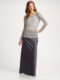 Lengthy, lustrous style can be paired with an airy blouse or timeless tank. Back zipperAsymmetrical stitchingTriacetateDry cleanImported Lengthy, lustrous style can be paired with an airy blouse or timeless tank. Back zipperAsymmetrical stitchingTriacetateDry cleanImported