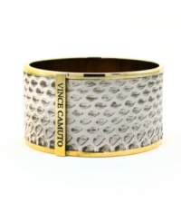 An exotic effect. Snake print patterns are all the rage in fashion right now, and Vince Camuto incorporates the look into this chic cuff bracelet. Crafted in gold tone mixed metal. Approximate diameter: 2-1/2 inches. An exotic effect. Snake print patterns are all the rage in fashion right now, and Vince Camuto incorporates the look into this chic cuff bracelet. Crafted in gold tone mixed metal. Approximate diameter: 2-1/2 inches.
