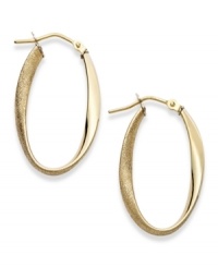 The perfect mix of texture and polish, these 14k gold hoop earrings feature a twisted design and chic, oval shape. Earrings secure with a lever backing. Approximate diameter: 1-1/6 inch. The perfect mix of texture and polish, these 14k gold hoop earrings feature a twisted design and chic, oval shape. Earrings secure with a lever backing. Approximate diameter: 1-1/6 inch.