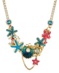 Enchantment under the sea, by Betsey Johnson. This frontal necklace combines gold tone mixed metal chains, crystal cup chain accents, blue oyster with glass pearl accent, turtle charm, turquoise starfish, pink lobster, pink and white fish, blue-colored crystal gems and pink starfish accent. Approximate length: 17 inches + 3-inch extender. Approximate drop: 2 inches. Enchantment under the sea, by Betsey Johnson. This frontal necklace combines gold tone mixed metal chains, crystal cup chain accents, blue oyster with glass pearl accent, turtle charm, turquoise starfish, pink lobster, pink and white fish, blue-colored crystal gems and pink starfish accent. Approximate length: 17 inches + 3-inch extender. Approximate drop: 2 inches.