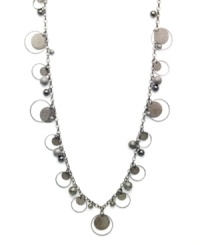 Sandblast paillettes contrast with dainty beaded details to form the striking spherical design of this long necklace from Style&co. Crafted in hematite tone mixed metal. Approximate length: 36 inches.