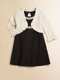 Cascading ruffles add girlish charm to a plush cotton bolero with metallic touches for dazzling style.Ruffled necklineThree-quarter sleeves with ruffled cuffsFront closureRuffled hemCottonMachine washImported Cascading ruffles add girlish charm to a plush cotton bolero with metallic touches for dazzling style.Ruffled necklineThree-quarter sleeves with ruffled cuffsFront closureRuffled hemCottonMachine washImported