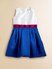 Crafted in a striking colorblock design, this cute-as-a-button frock is elegant in shiny satin with a full, pleated skirt.Jewelneck with rosette detailSleevelessBack zipperFull, pleated skirtPolyesterDry cleanMade in the USA Crafted in a striking colorblock design, this cute-as-a-button frock is elegant in shiny satin with a full, pleated skirt.Jewelneck with rosette detailSleevelessBack zipperFull, pleated skirtPolyesterDry cleanMade in the USA