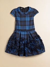 She'll be mad about plaid in this tartan-inspired frock with Peter Pan collar, pleated waistband and full, embroidered skirt.Peter Pan collarCap sleevesBack zipperPleated waistFull skirt with rosettes65% polyester/35% viscoseDry cleanImported