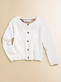 A classic sweater with Burberry touches, perfect atop her pretty dresses, skirts or even her jeans.Ribbed crew necklineButton frontEmbroidered tonal chest logoRibbed patch pocketLong sleeves with ribbed cuffsRibbed hemCottonHand washImported Please note: Number of buttons may vary depending on size ordered. A classic sweater with Burberry touches, perfect atop her pretty dresses, skirts or even her jeans.Ribbed crew necklineButton frontEmbroidered tonal chest logoRibbed patch pocketLong sleeves with ribbed cuffsRibbed hemCottonHand washImported Please note: Number of buttons may vary depending on size ordered.